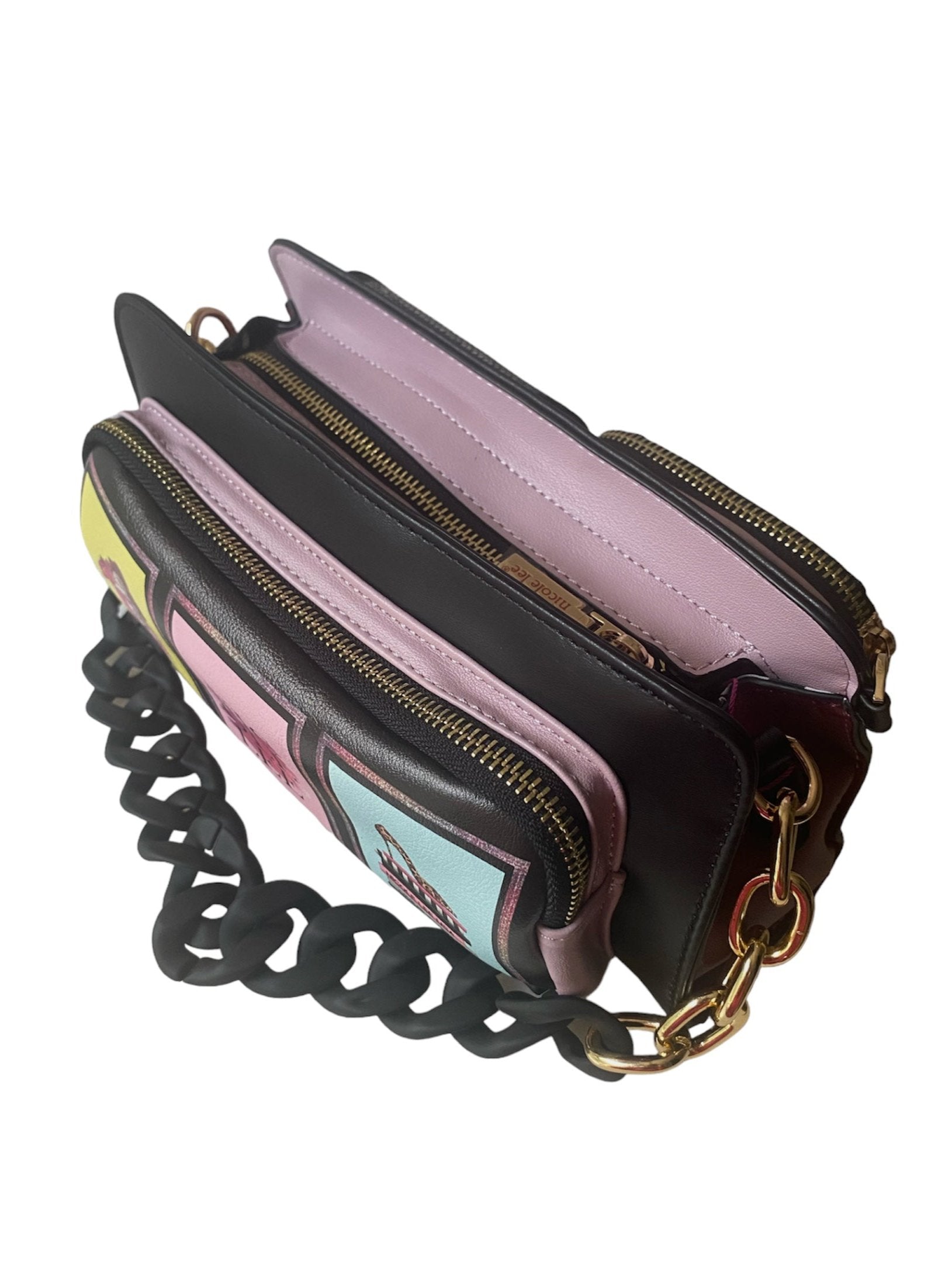 A stylish handbag featuring an artistic image of a woman shoe and makeup items, showcasing elegance and personal expression.