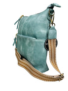 A sleek blue leather crossbody bag featuring a stylish strap for easy carrying. Perfect for everyday use!