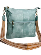 A sleek blue leather crossbody bag featuring a stylish strap for easy carrying. Perfect for everyday use!