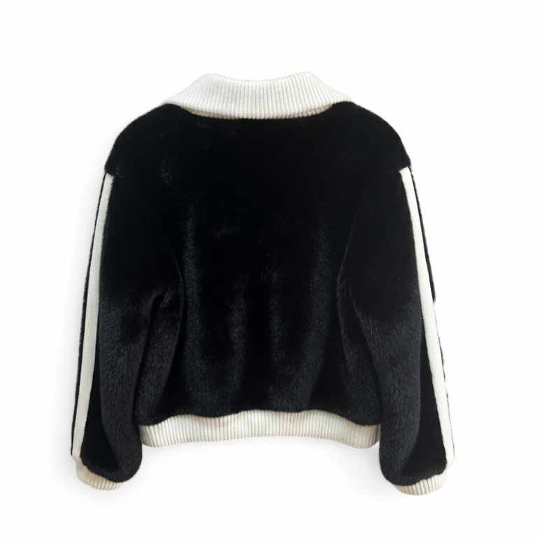 Black sweater with white trim on a white background